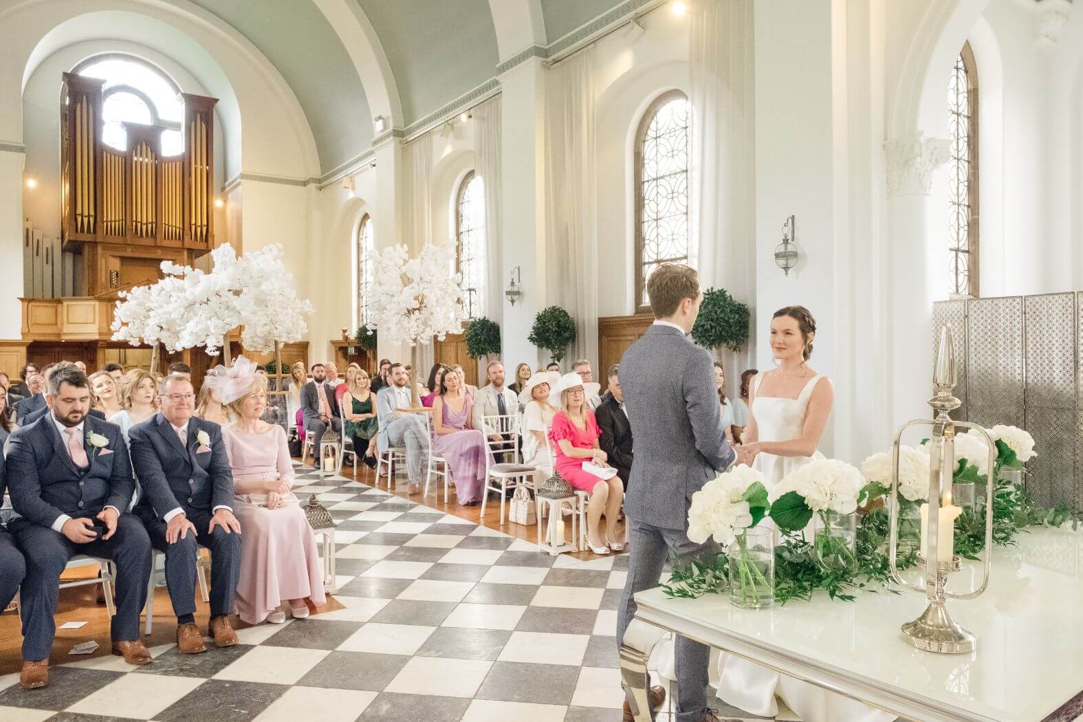 Experienced wedding photographer capturing a natural, candid moment between the couple