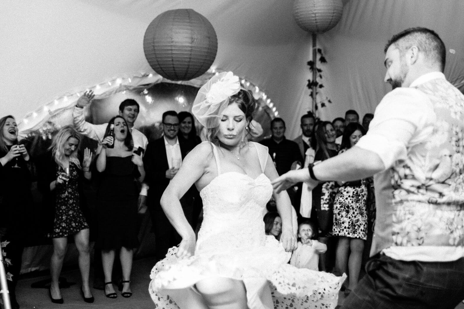 Guests dancing on the wedding reception dance floor