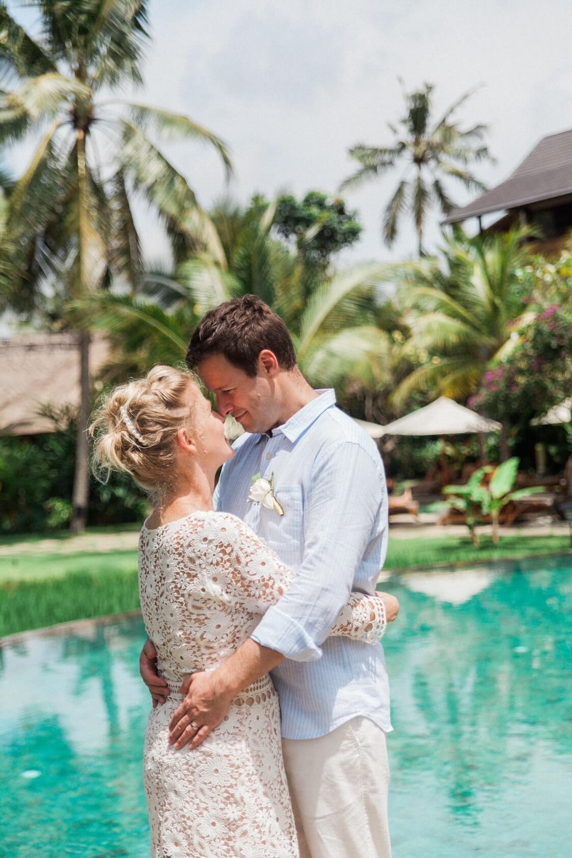 Couple at a Bali wedding by the pool