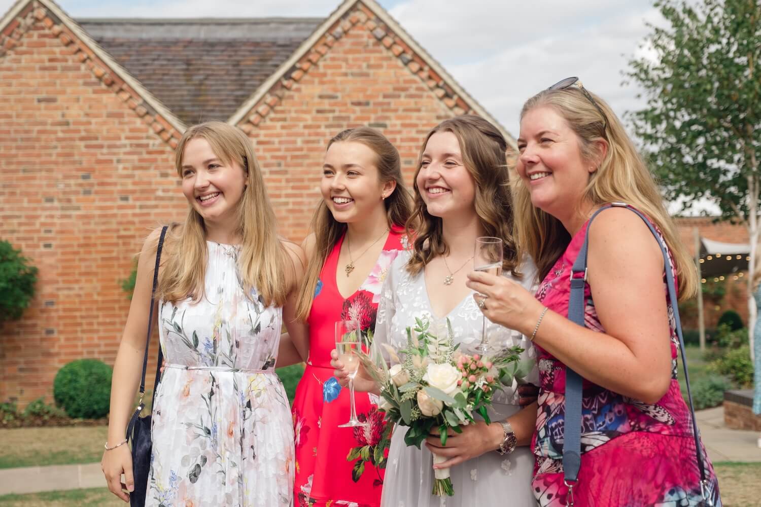 Wedding guests celebrating at Alrewas Hayes