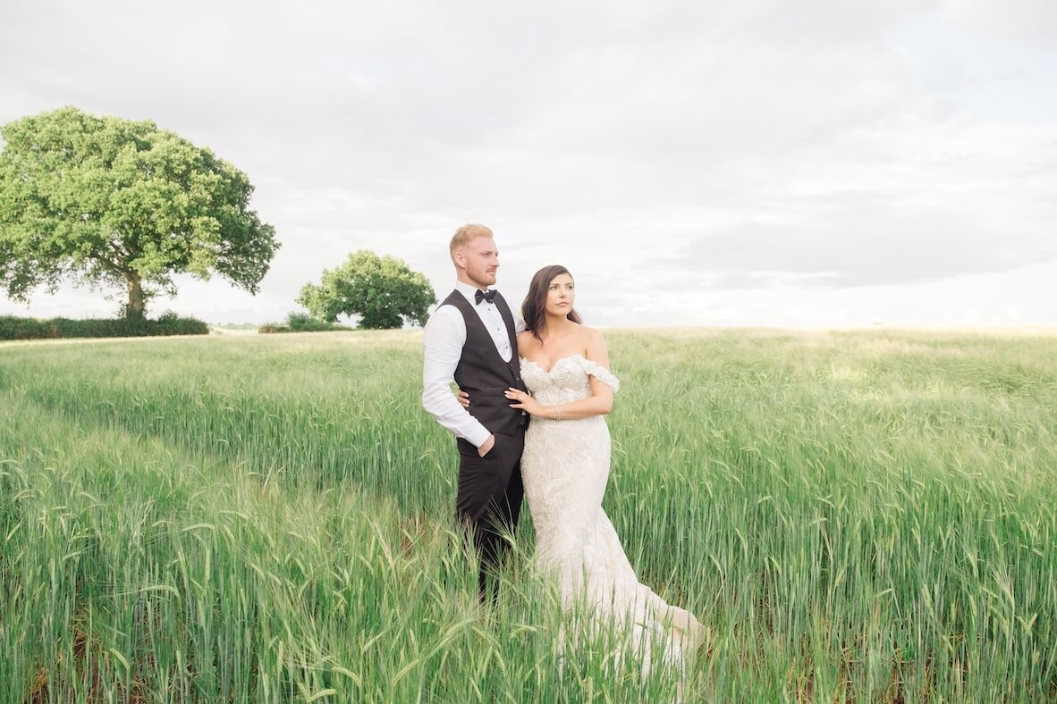 Black tie wedding portrait of the bride and groom
