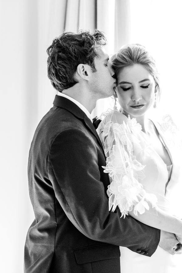 Black tie theme wedding, guests in formal evening wear