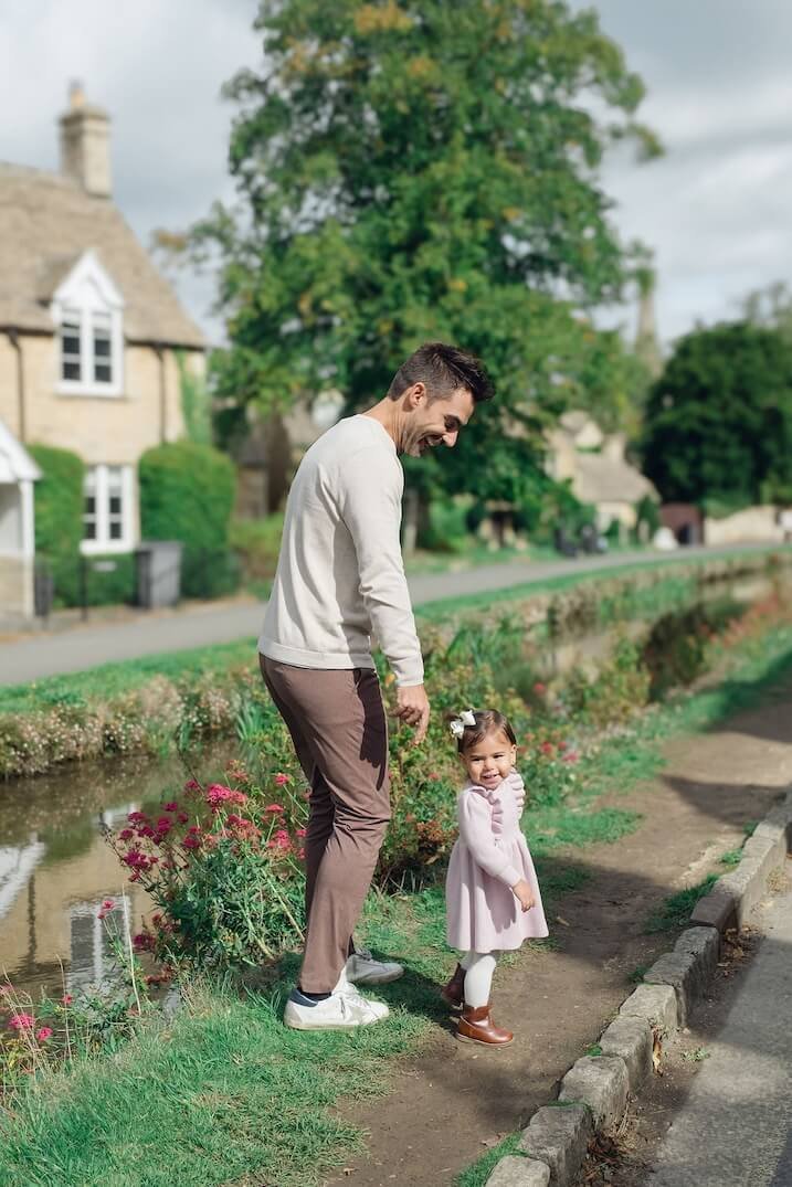 Young child playing during a Cotswolds family photo session