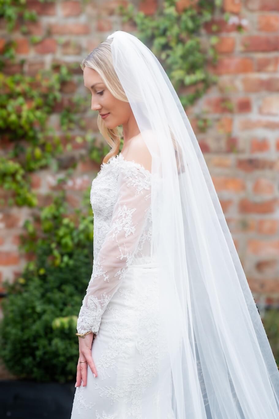 Bride posing outside at Grange Wedding Barn Cheshire