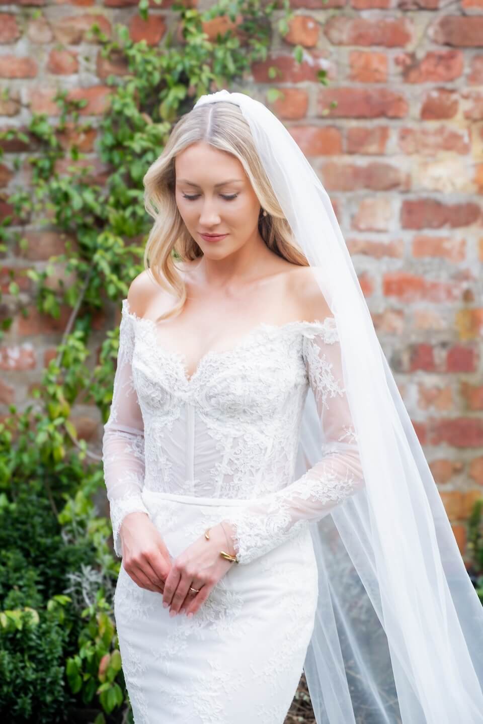 Bride posing outside the barn at Grange Wedding Barn Cheshire