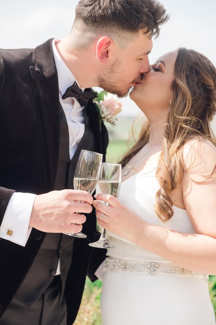Bride and groom during the drinks reception at Hyde House