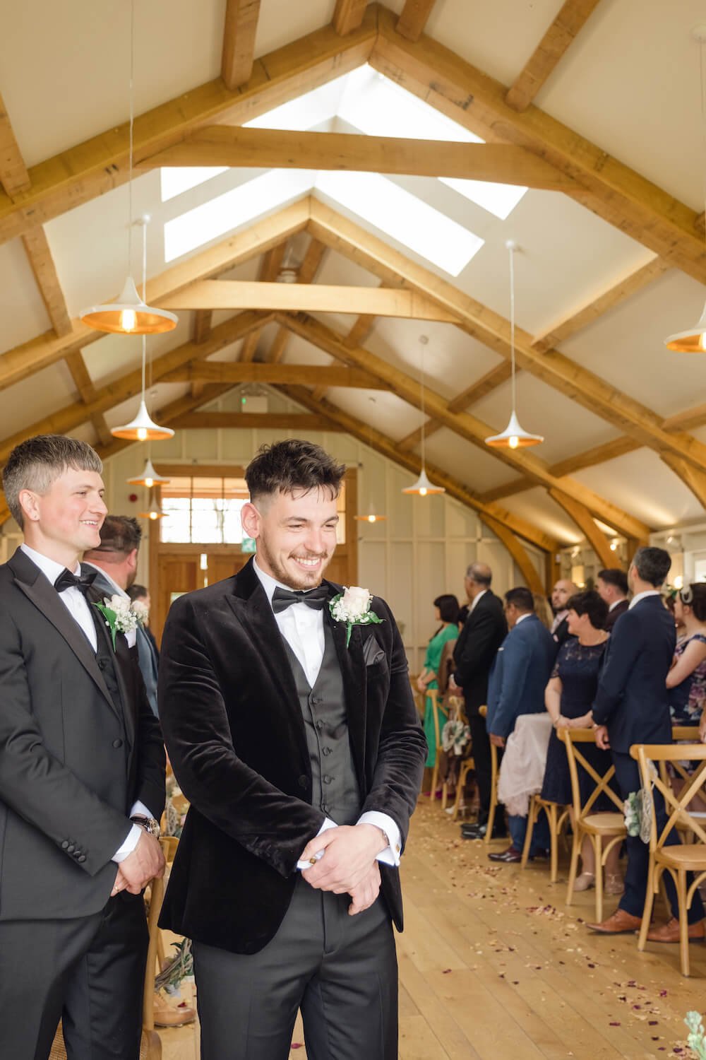 Groom waiting at the top of the aisle at Hyde House