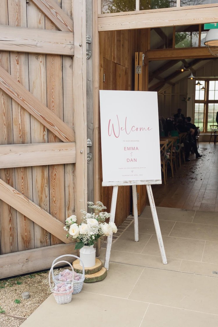 The Grange ceremony barn set for Dan and Emma's wedding at Hyde House