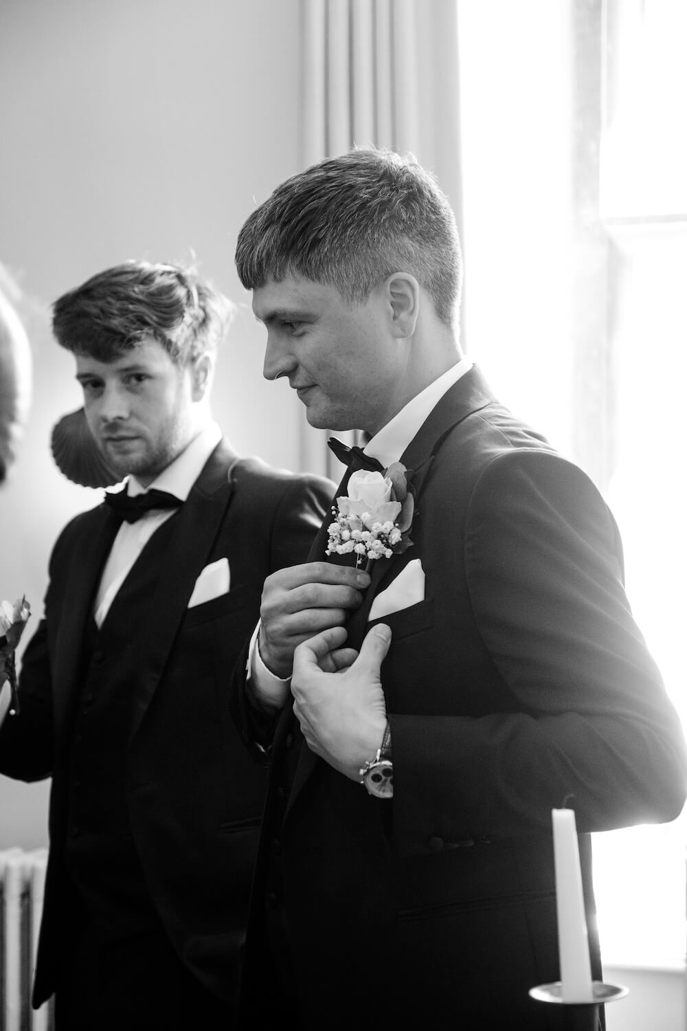 Best man with a flower in his pocket before the Cotswold wedding