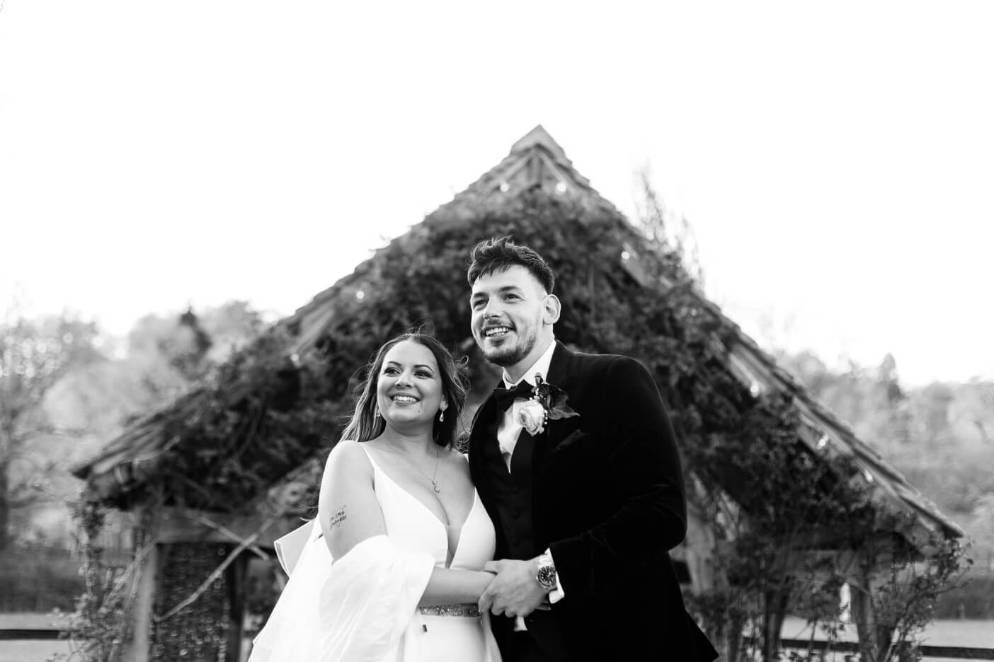 Bride and groom outside in the golden hour at Hyde House