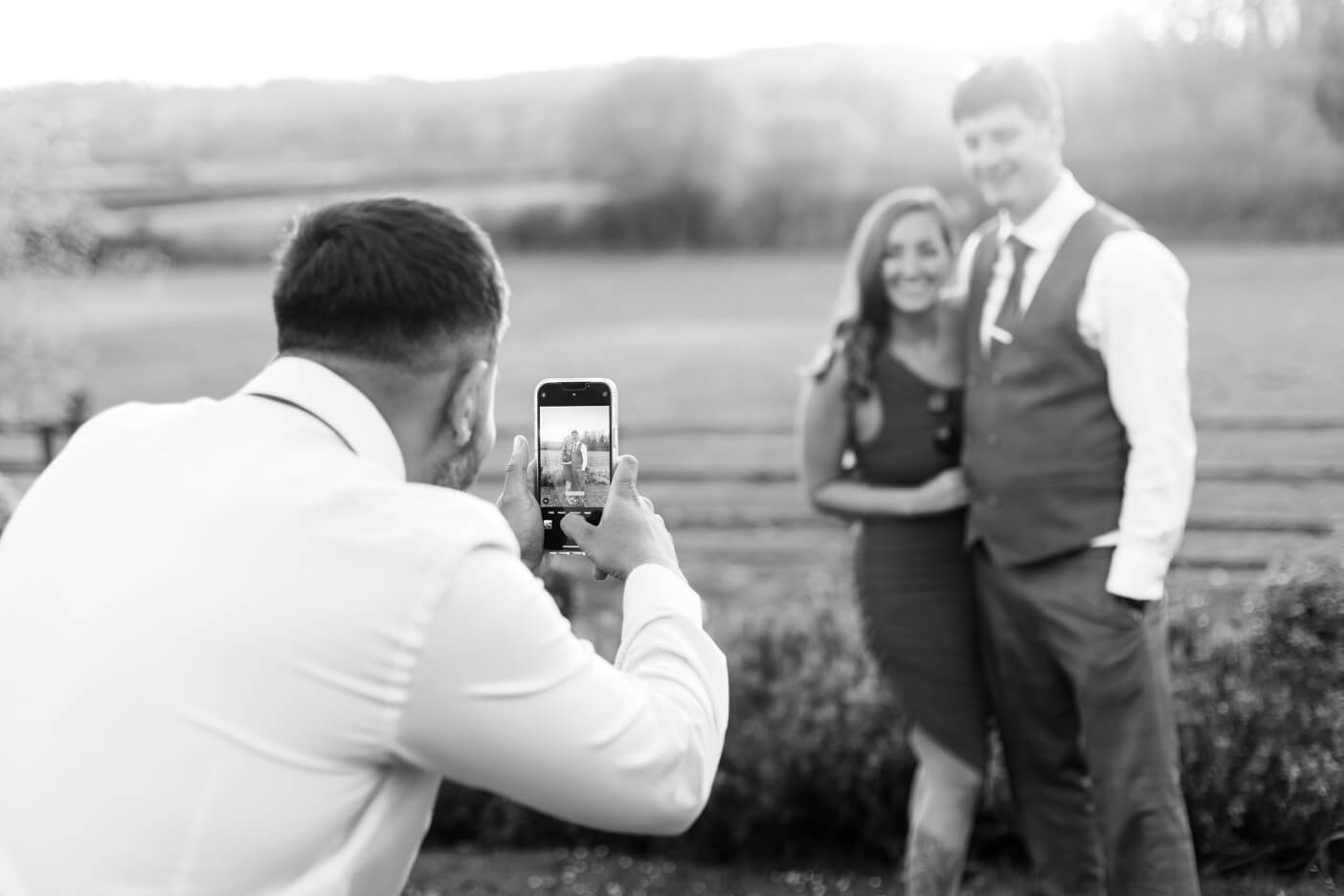 Guest taking a photo of another guest at Hyde House