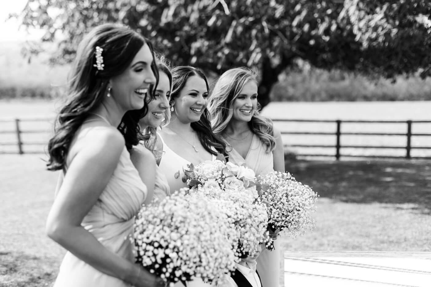 Black and white of the bride and bridesmaids at Hyde House