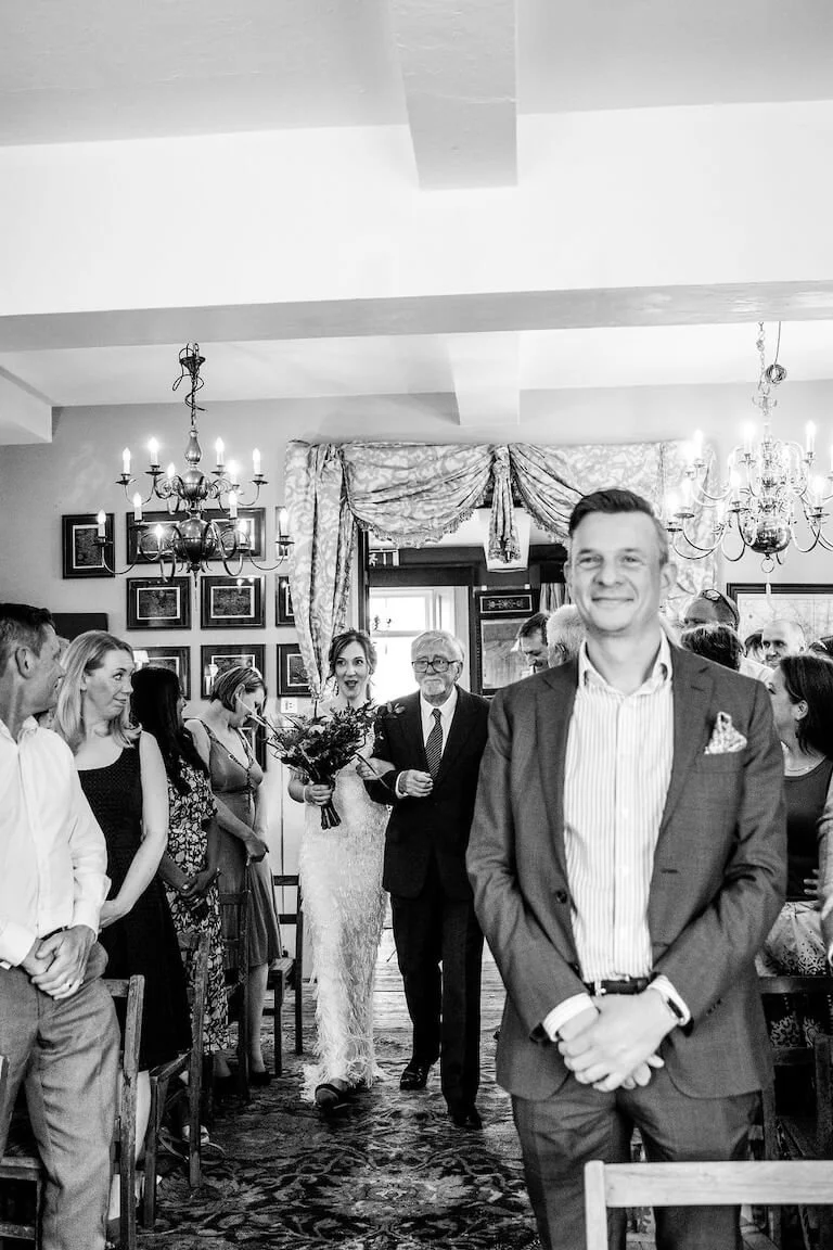 Bride coming down the aisle at Brunswick House