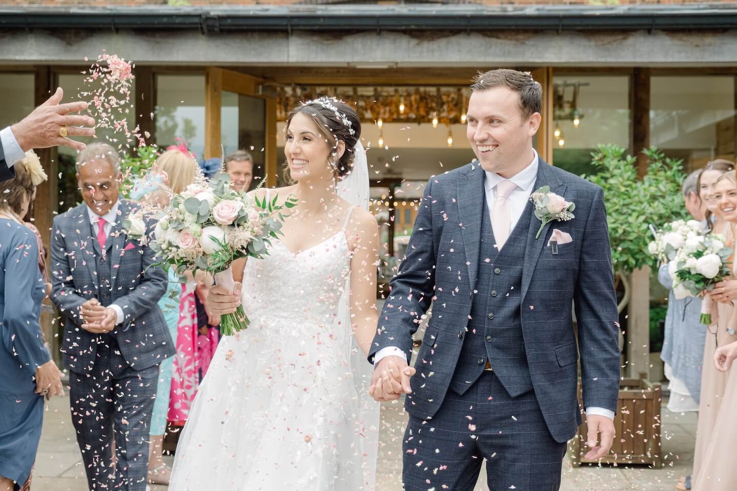 Confetti celebration at a Mythe Barn wedding