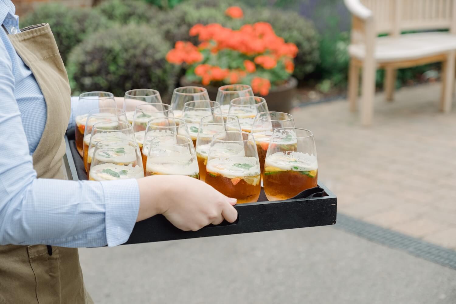Tray of drinks at a Mythe Barn wedding reception