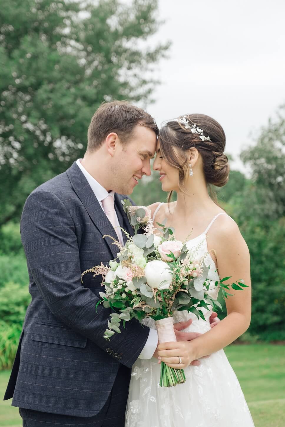 Bride and groom portrait at Mythe Barn