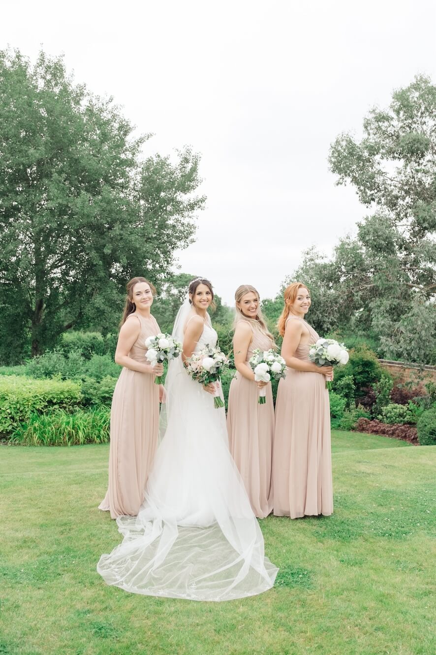 Bride with her bridesmaids at Mythe Barn
