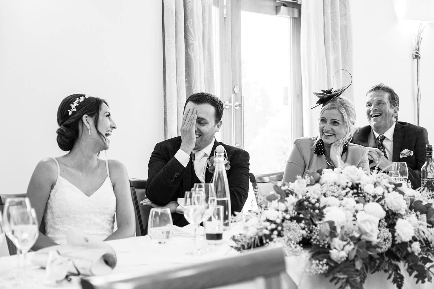 Couple during the speeches at their Mythe Barn wedding