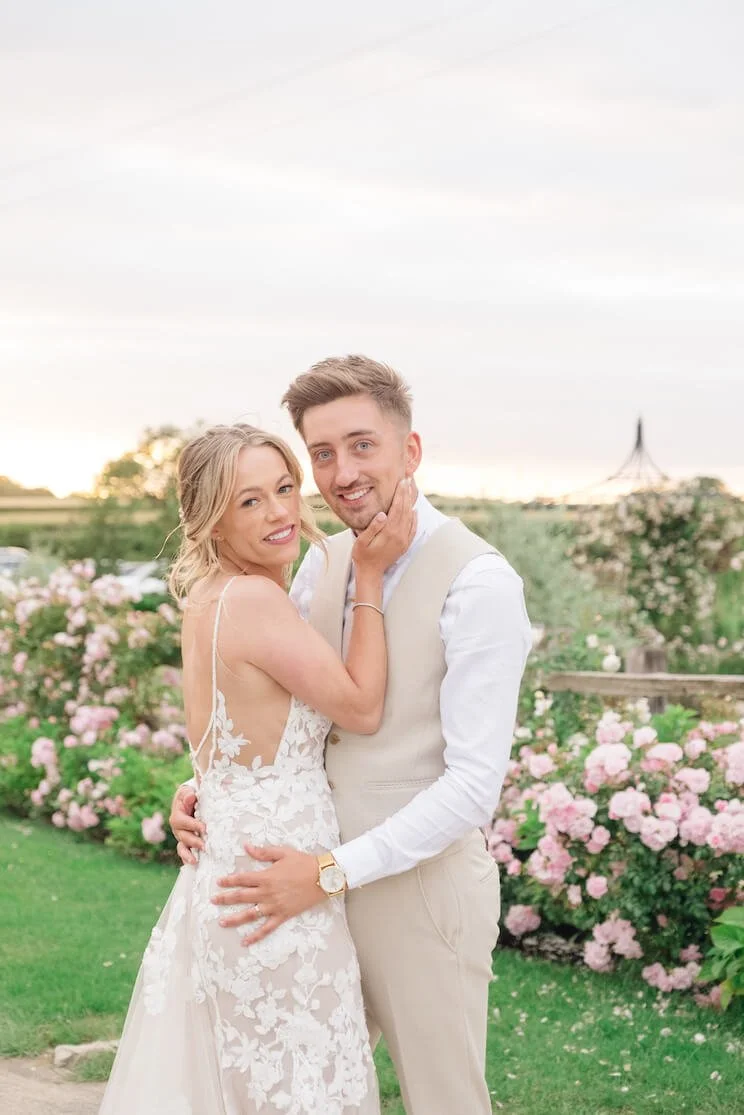 Bride and groom at golden hour at Stratton Court Barn