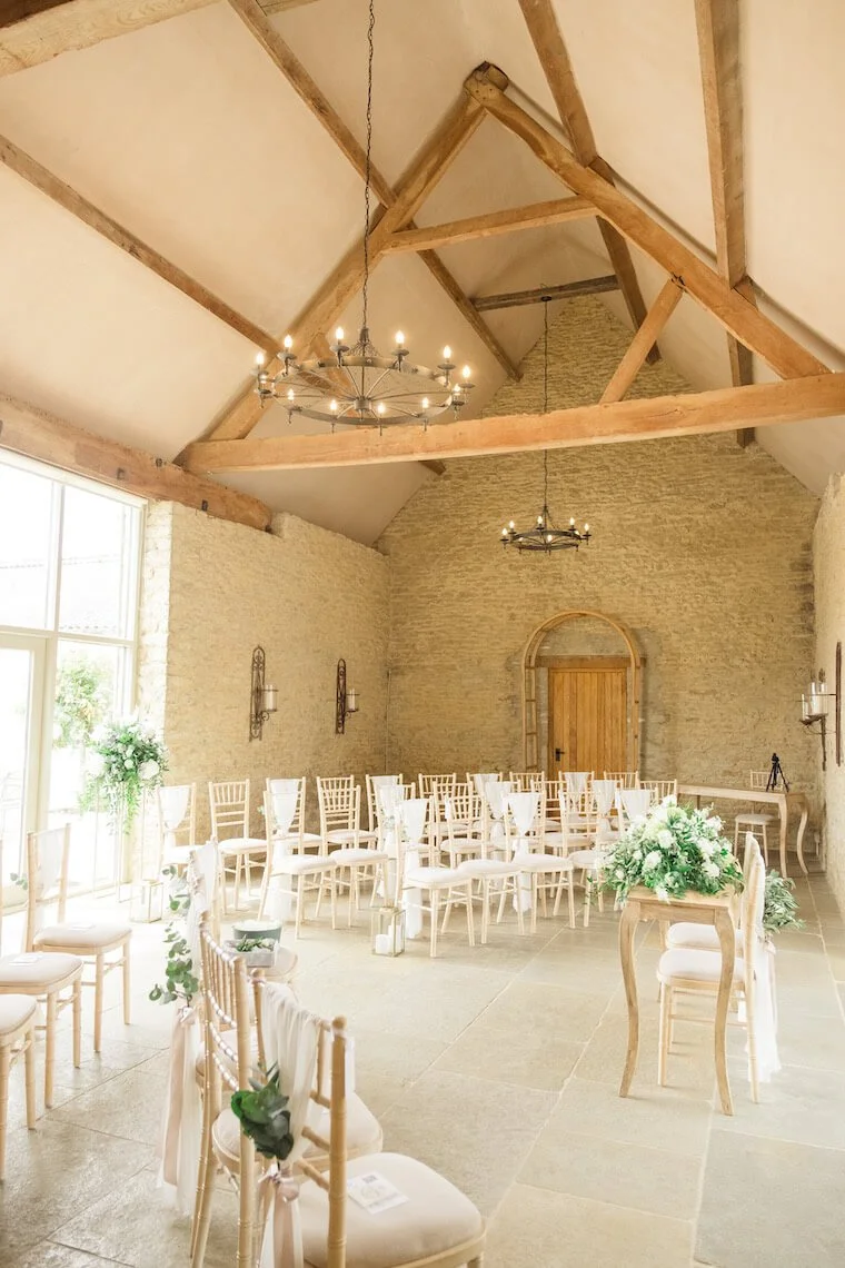 Ceremony seating in the main barn at Stratton Court Barn