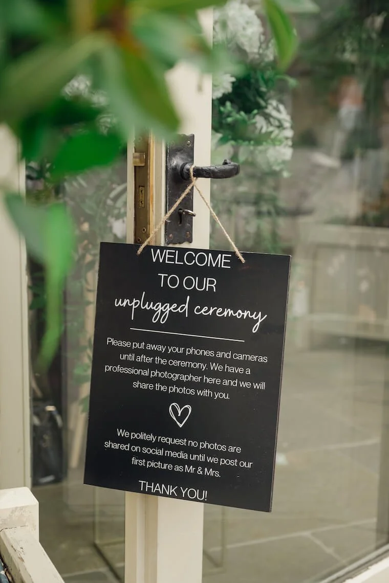 Unplugged ceremony sign at Stratton Court Barn