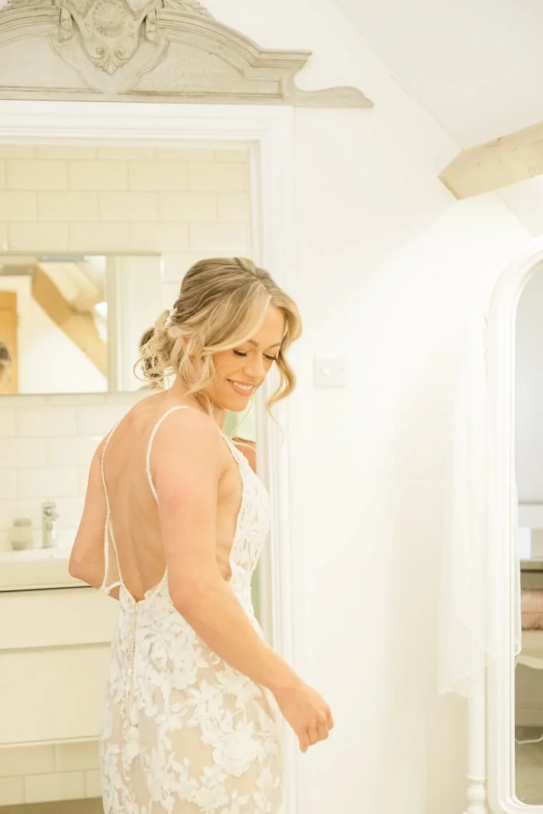 Bride ready in her dress at Stratton Court Barn