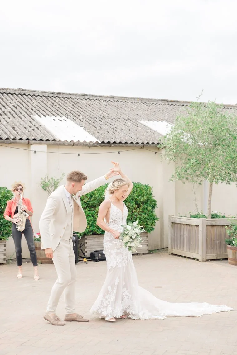 Bride and groom dancing at Stratton Court Barn