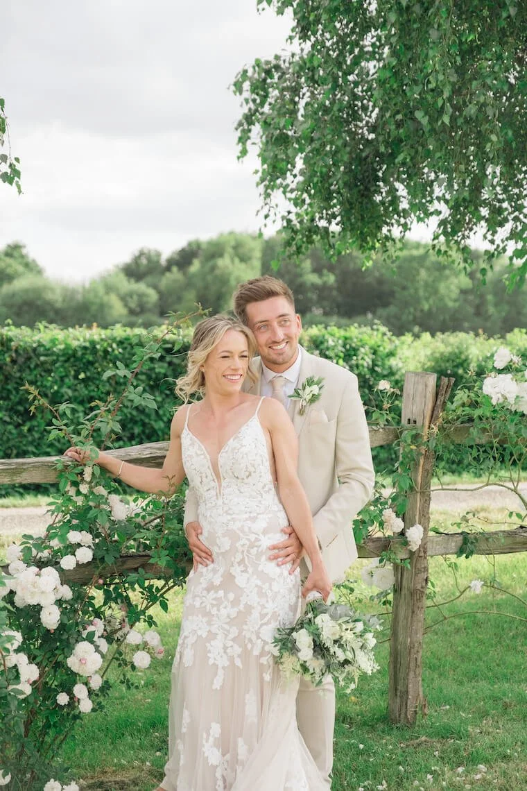 Couple with their wedding photographer