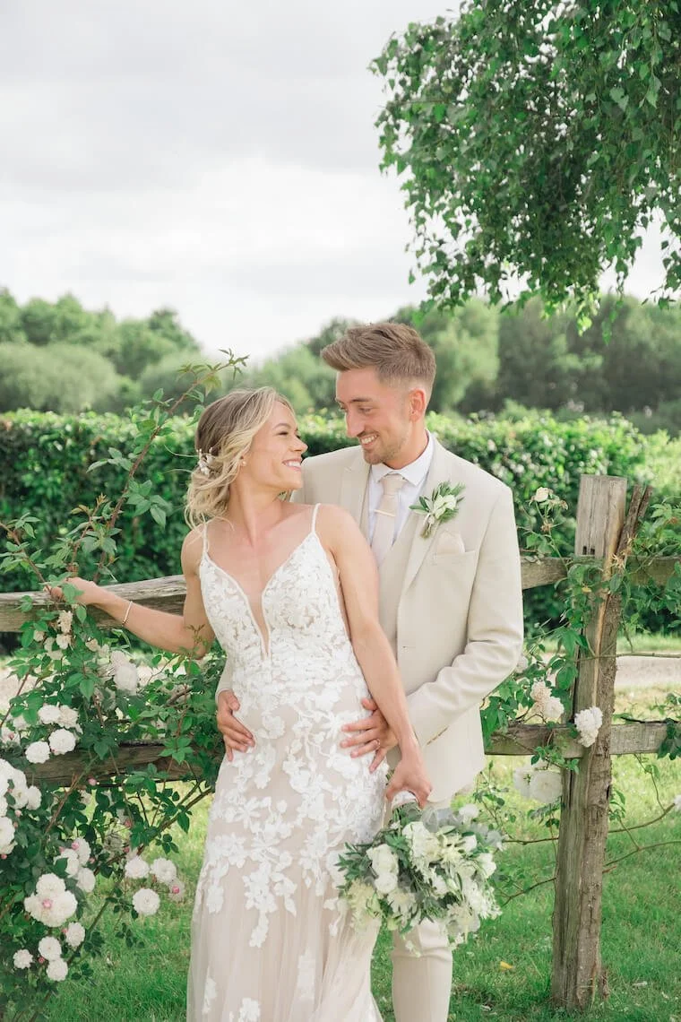 Newlyweds in the gardens at Stratton Court Barn