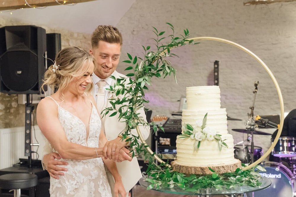 Cake cutting at a Stratton Court Barn wedding