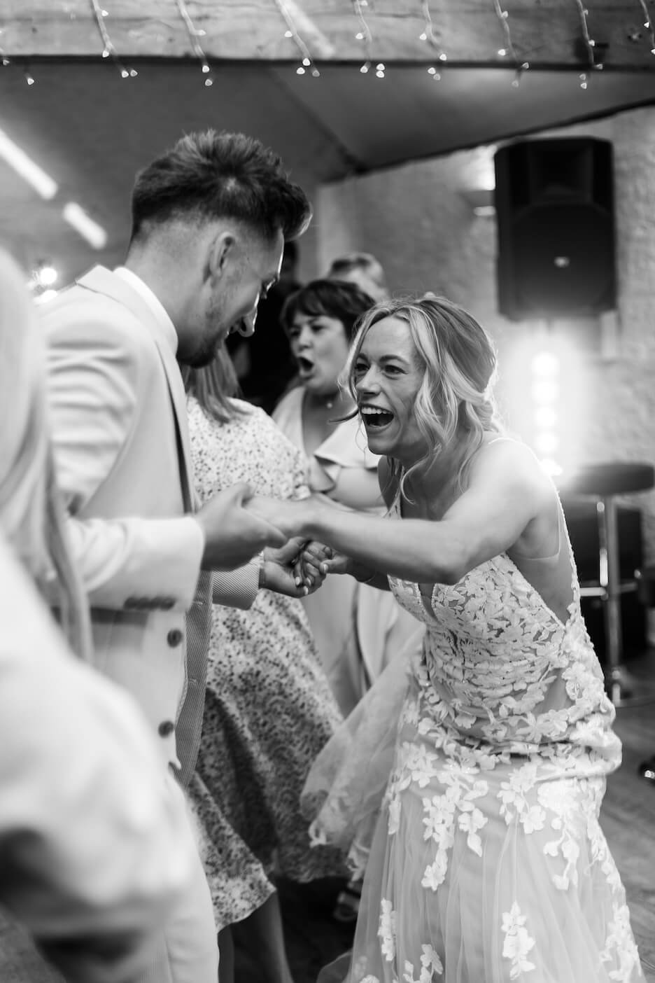 Couple with their wedding photographer