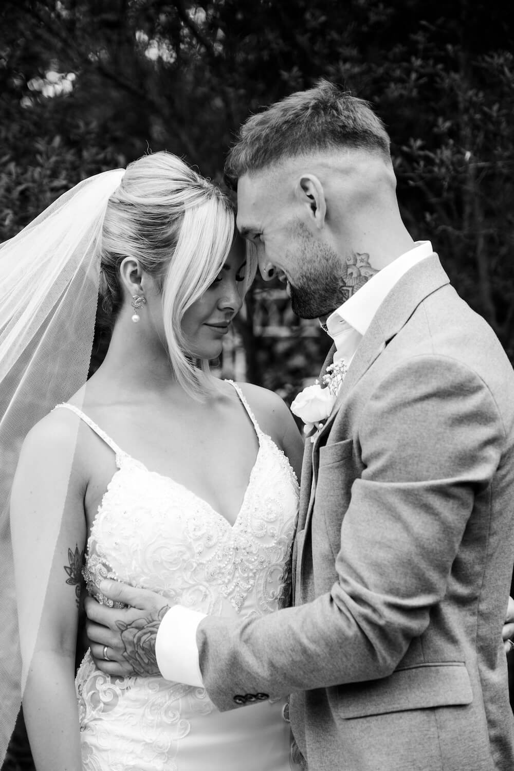 Black and white portrait of the bride and groom at Warwick House