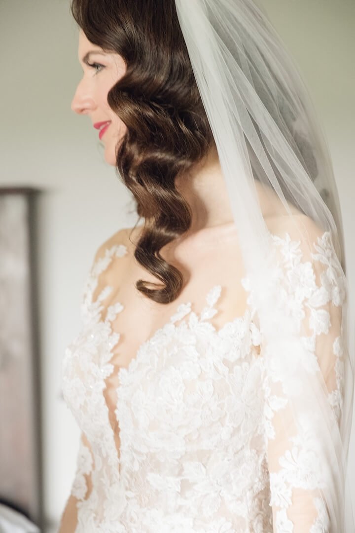 Wedding dress detail shot showing the fabric and finish