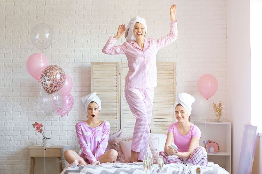 Hens laughing together as they break the ice at the start of the party