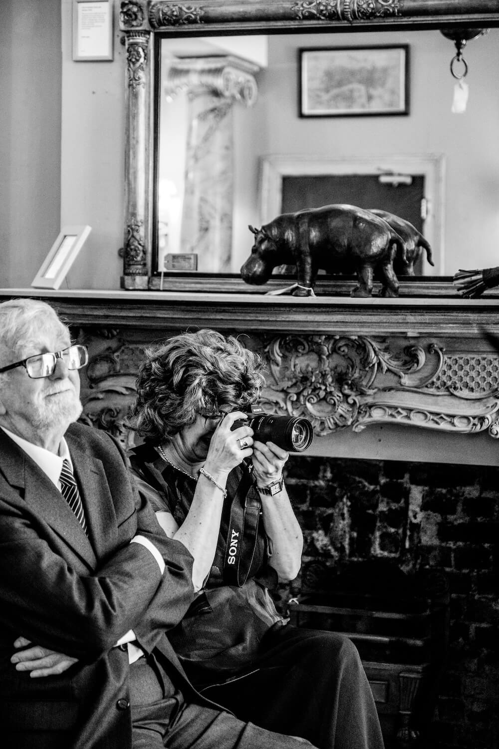 A guest taking a photo at the London city micro wedding