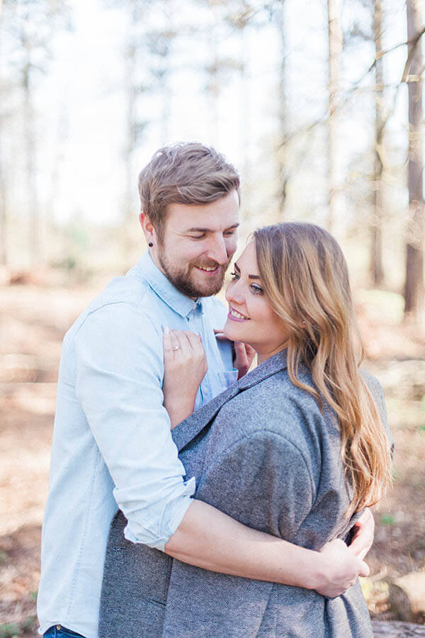 Couple celebrating their engagement during a pre-wedding shoot