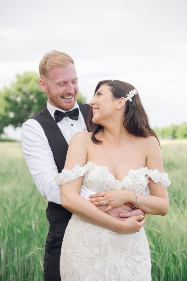 Bridal portrait in soft natural light showing the detail of the dress