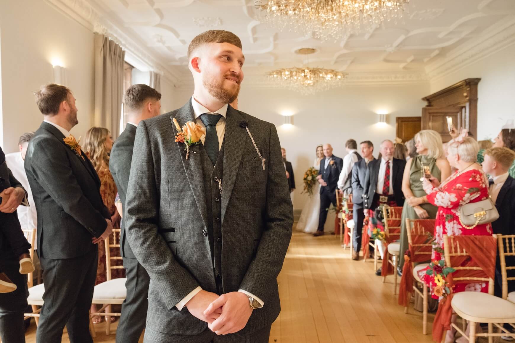 Groom waiting in the ceremony room at Standon Hall