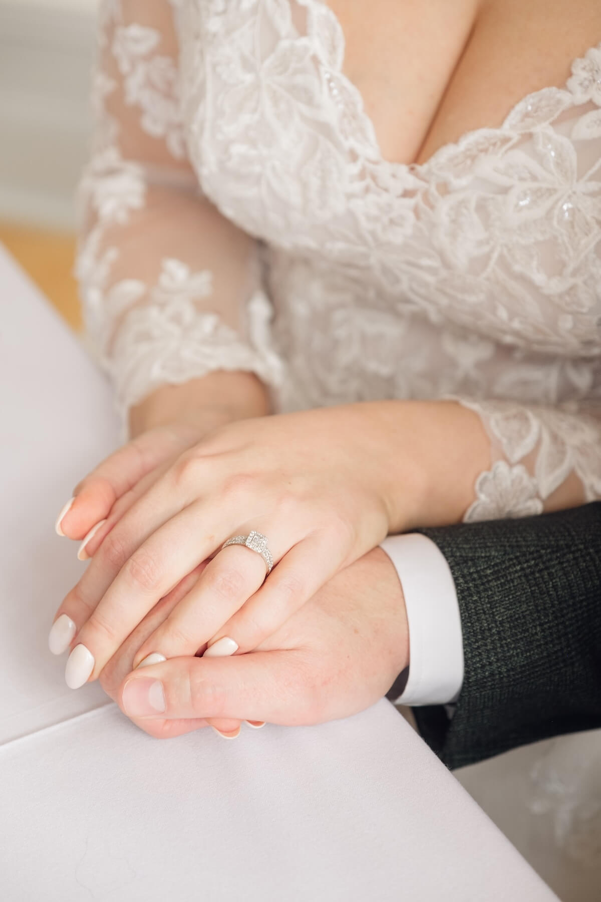 Wedding rings during the ceremony at Standon Hall