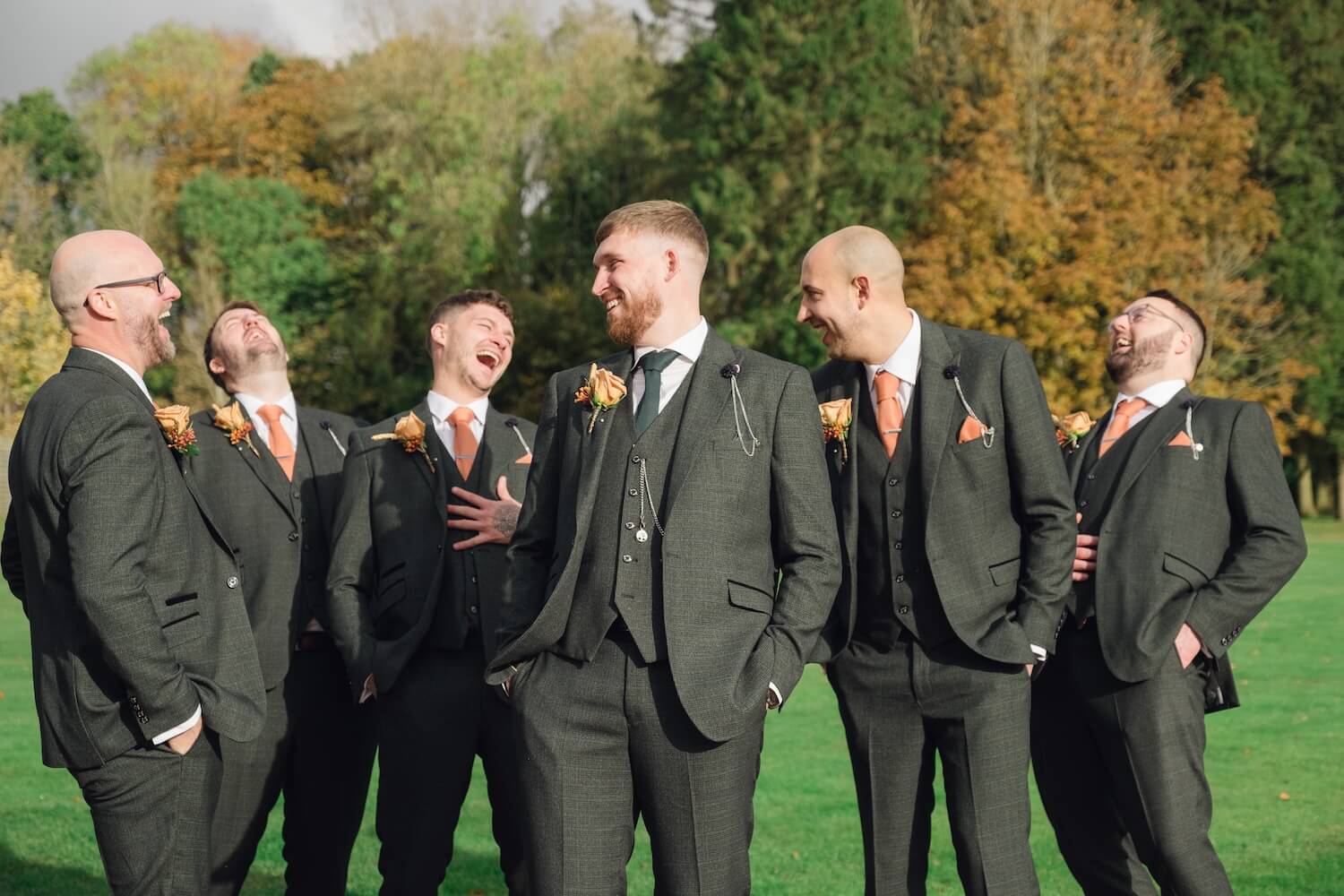Groomsmen laughing at Standon Hall