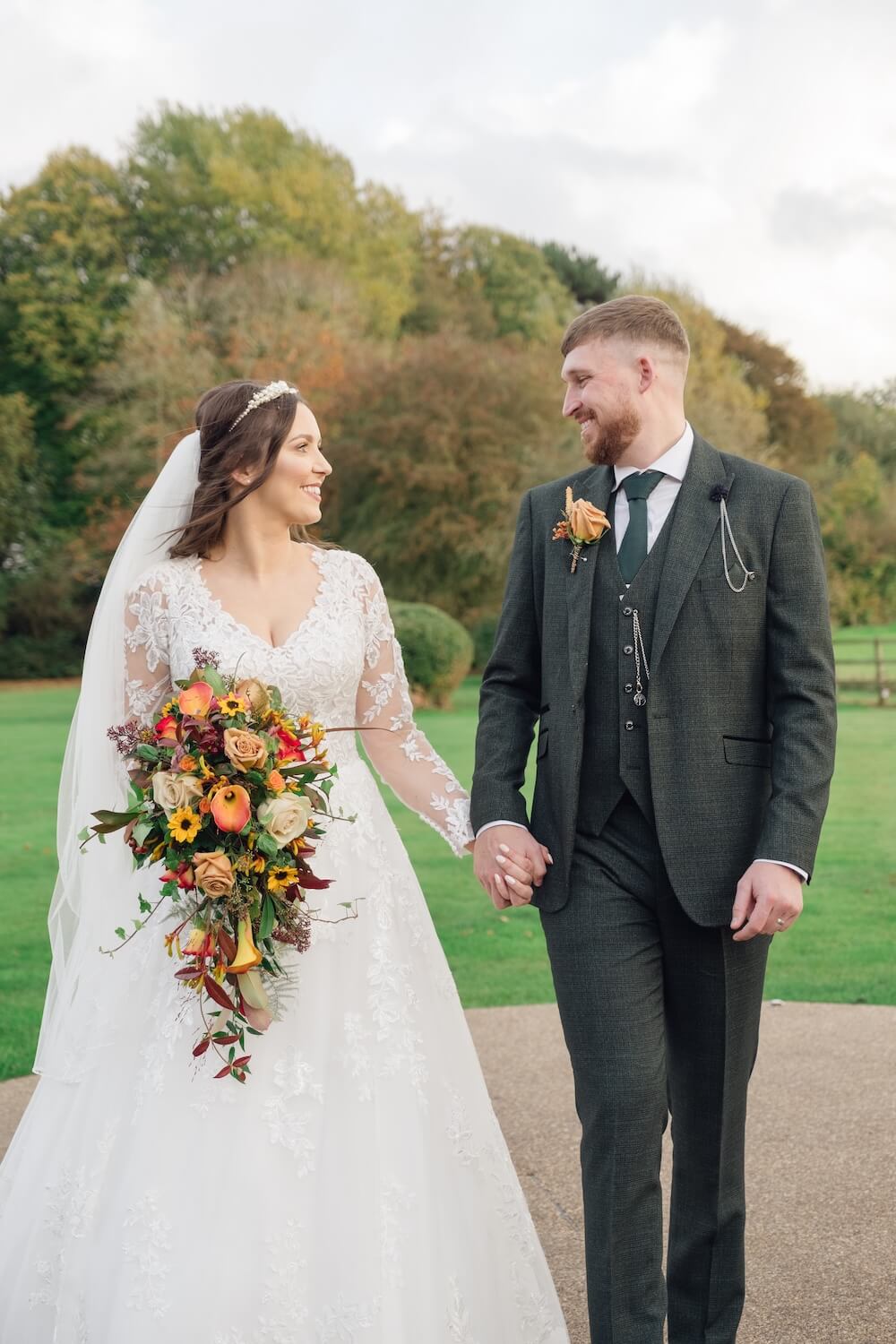 Bride and groom in the gardens at Standon Hall