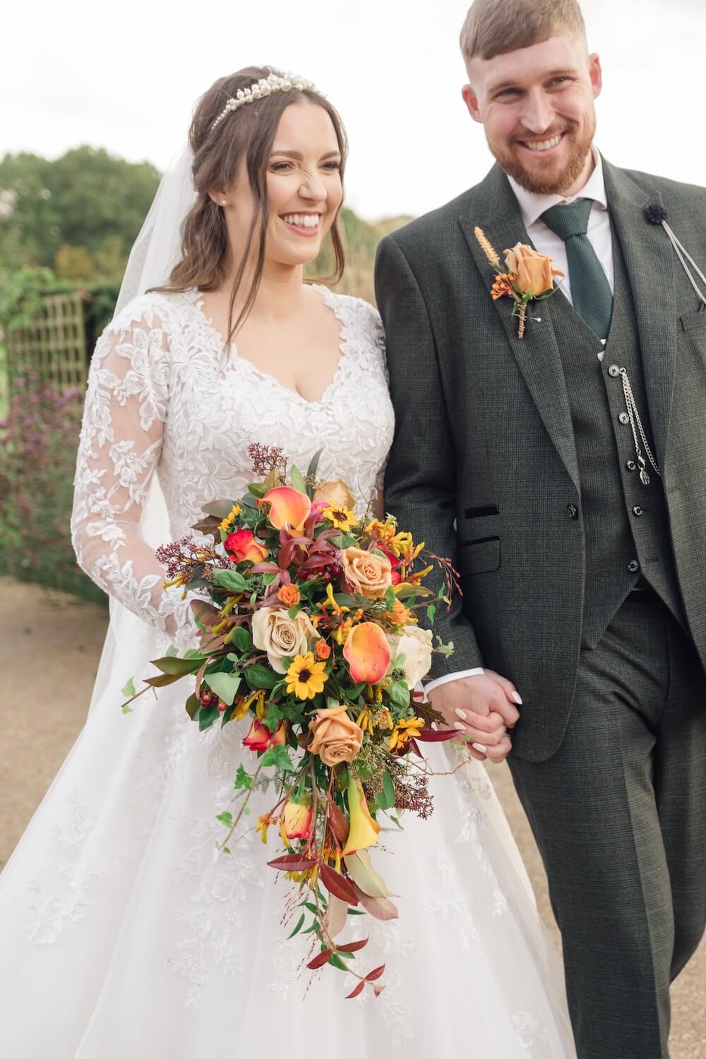 Bride and groom portrait in the grounds at Standon Hall