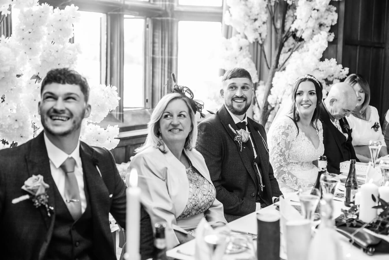 Celebration during the wedding breakfast at Standon Hall