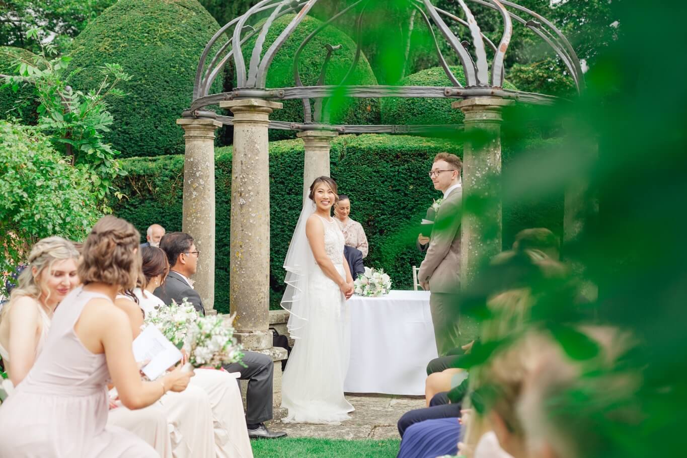Wedding ceremony in the White Garden at Birtsmorton Court in the Malvern Hills
