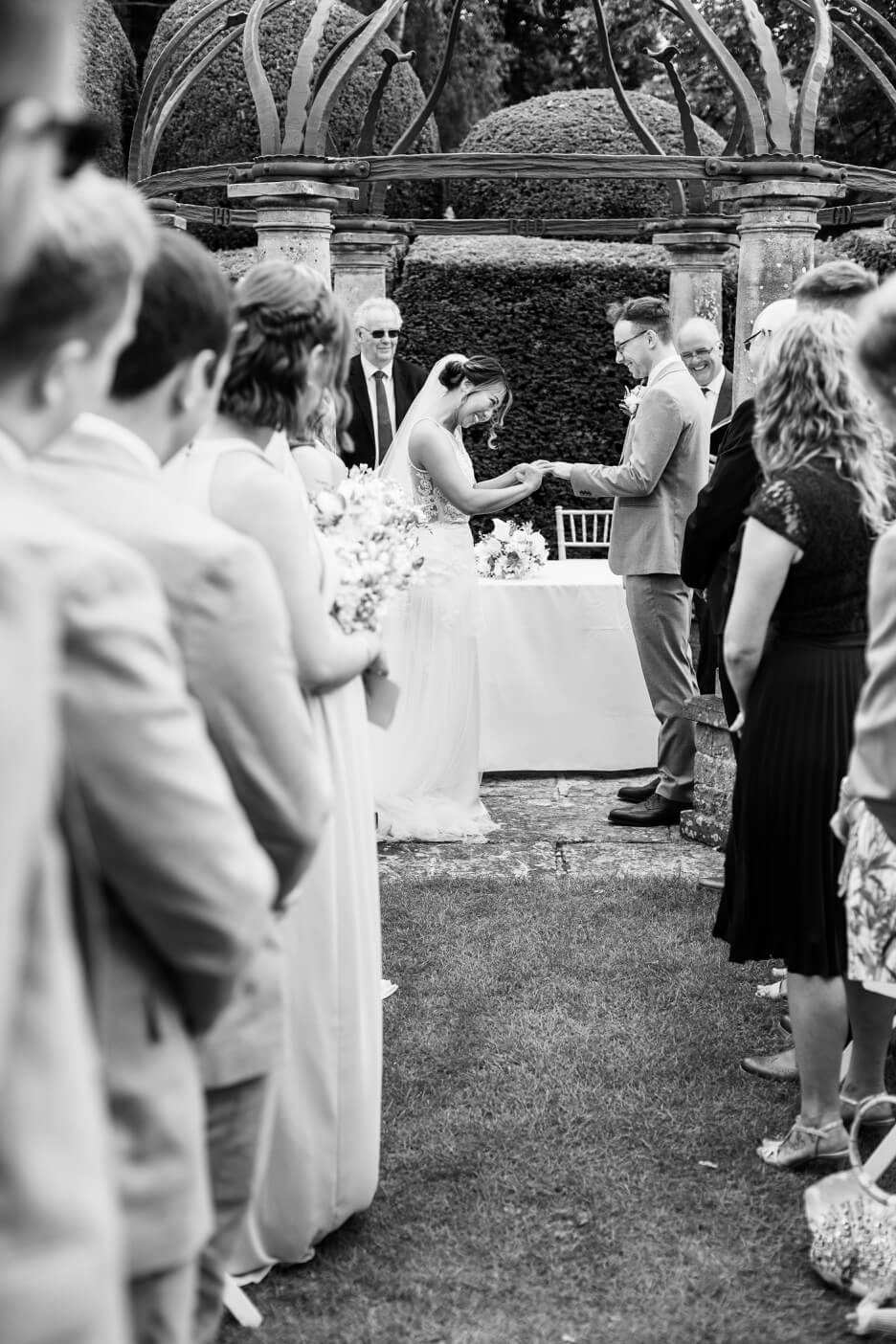 Wedding ring going on the finger during the Birtsmorton Court ceremony
