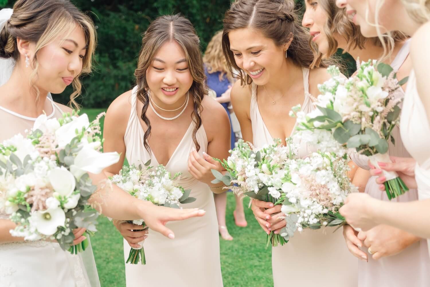 Bridesmaids admiring the bride's ring at Birtsmorton Court