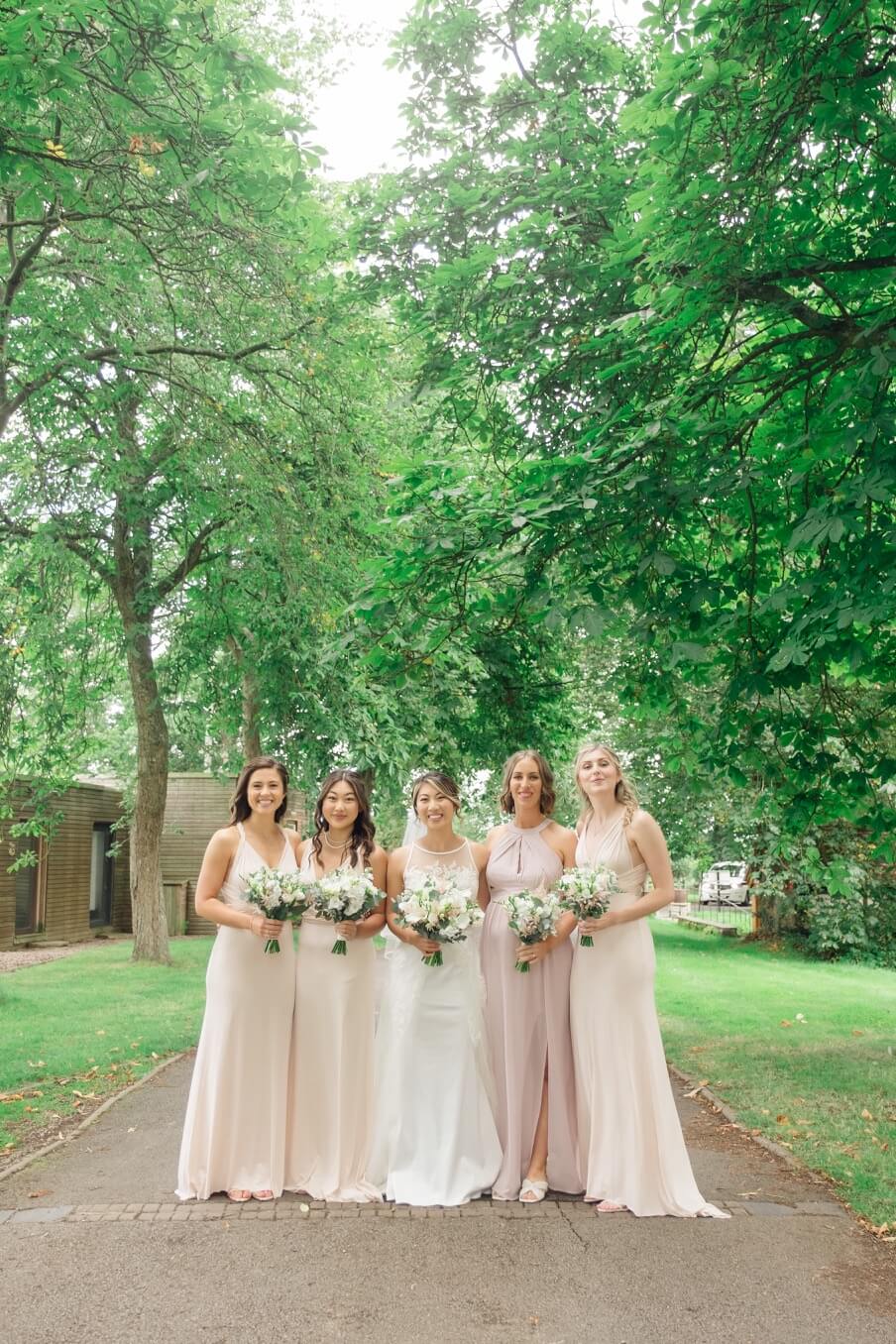 Bride with her bridesmaids before the ceremony at Birtsmorton Court