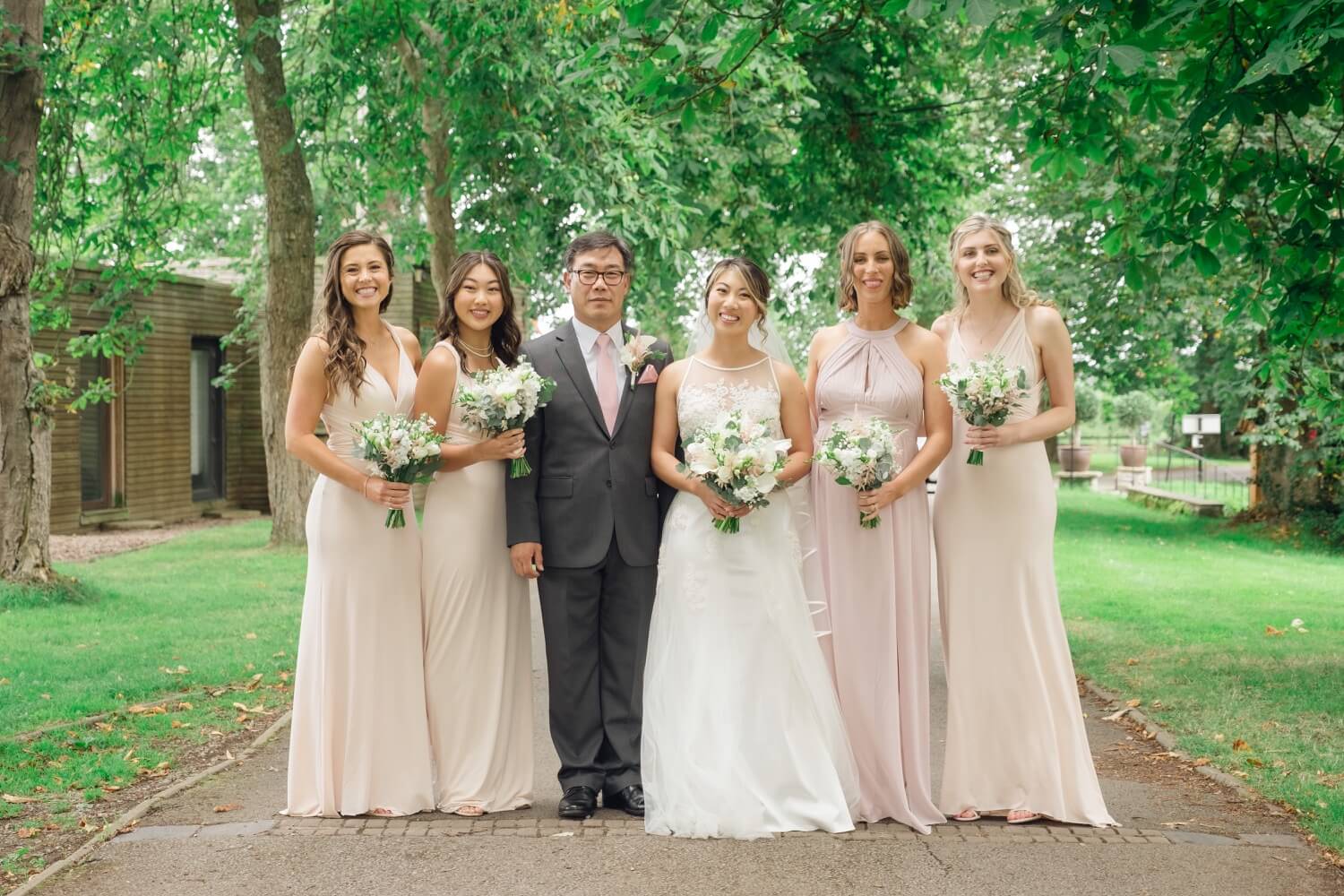 Bride with her bridesmaids and father at Birtsmorton Court