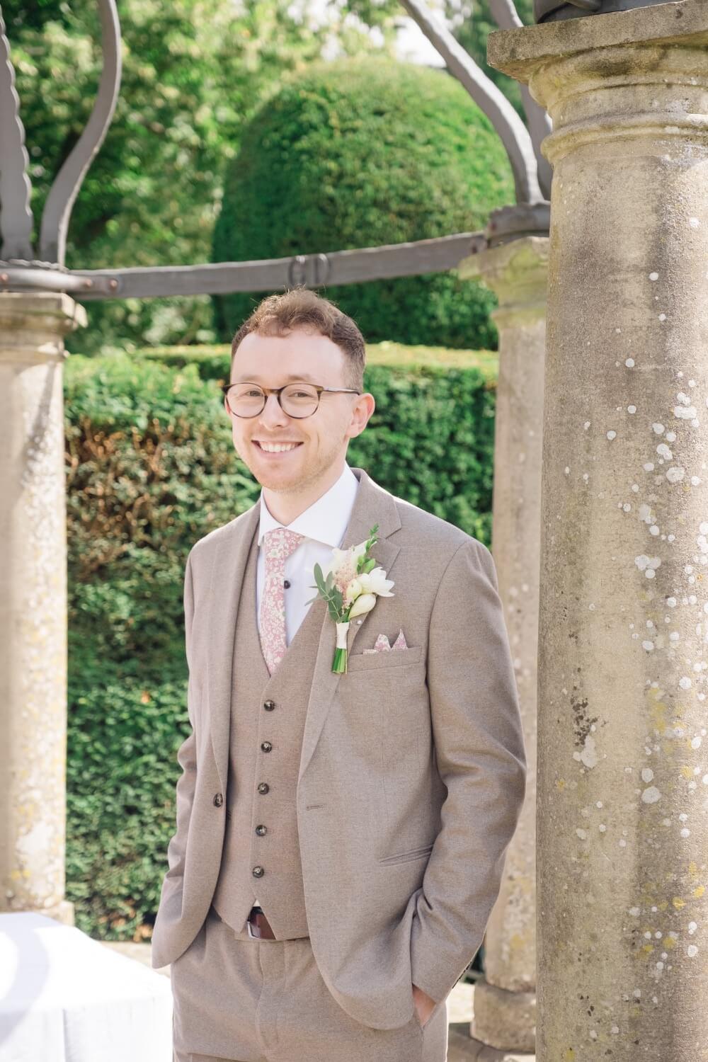 Groom waiting in the ceremony area at Birtsmorton Court