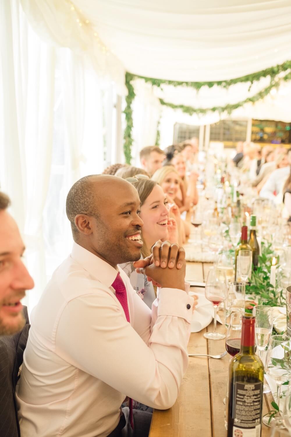 Guests listening to the speeches at Birtsmorton Court